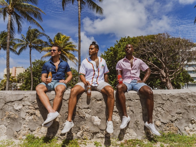 Friends sitting on a wall