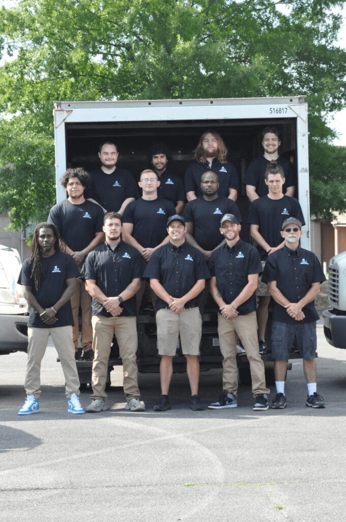 local movers in Knoxville posing for a Mitchell Moving company photo